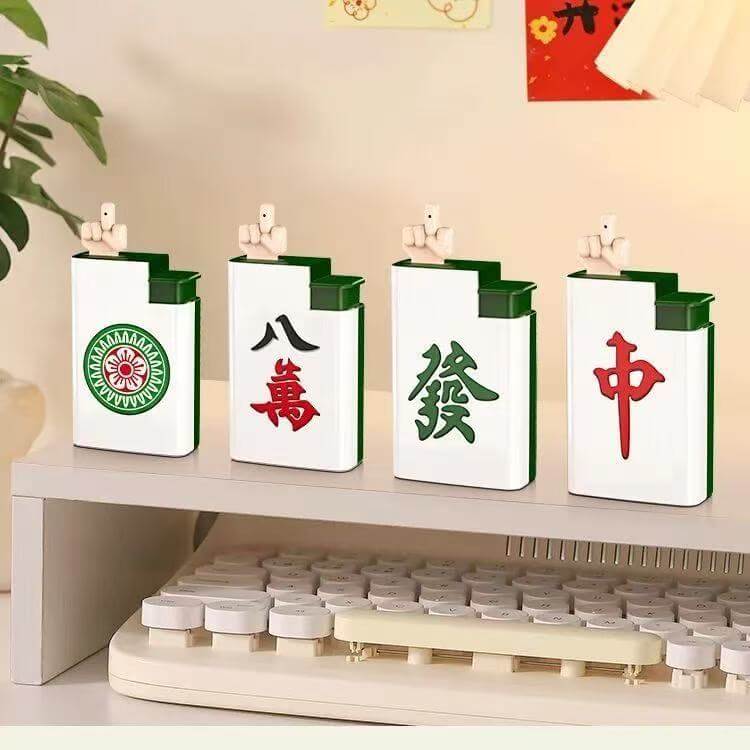 Colorful decorative items with Chinese symbols arranged on a desk, adding a fun touch to the workspace.